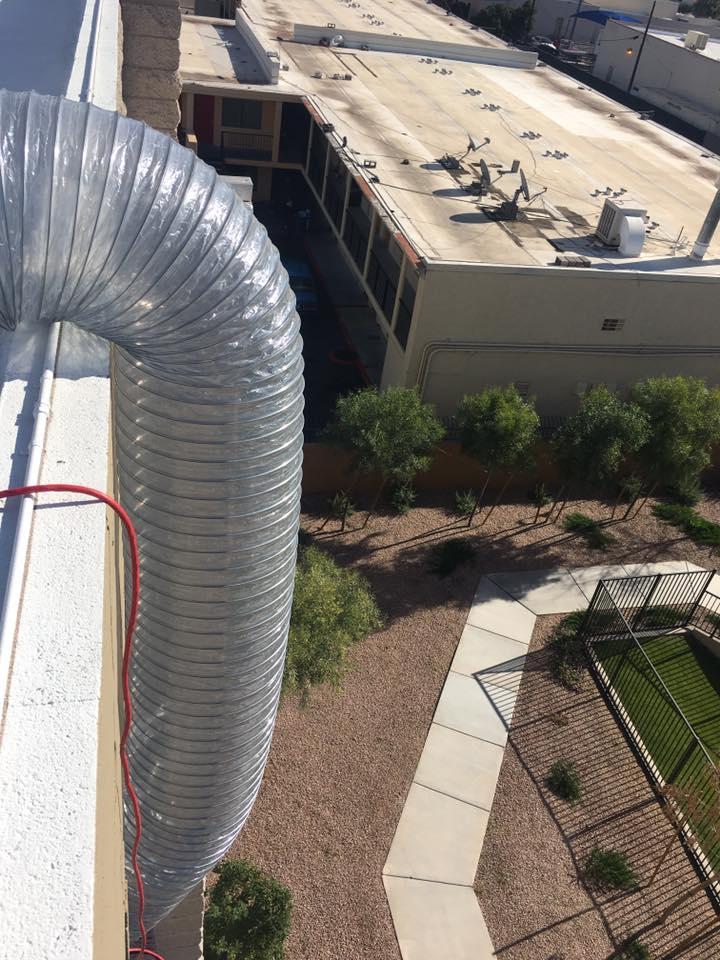 EcoForce rooftop bed bug heat treatment ducting setup for a multi-story job